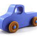 Handmade wood toy truck painted blue with metallic sapphire blue trim and nonmarking amber shellac wheels from my Play Pal Collection.