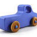 Handmade wood toy truck painted blue with metallic sapphire blue trim and nonmarking amber shellac wheels from my Play Pal Collection.