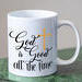 Picture of religious mug with the design that says God is good all the time and a gold cross.