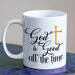 Picture of religious mug with the design that says God is good all the time and a gold cross.