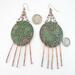 Paisley-impressed 2-inch copper disc Chandelier Boho Earrings Emerald green and antiqued Patina, Melted Twists of Copper Dangles, Argentium 935 Sterling Silver Ear Wires shown next to a US quarter and dime for size reference