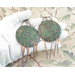 Paisley-impressed 2-inch copper disc Chandelier Boho Earrings Emerald green and antiqued Patina, Melted Twists of Copper Dangles, Argentium 935 Sterling Silver Ear Wires photo of earring in gloved hand to show size