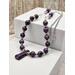 26 inch long necklace featuring purple lepidolite round beads, pewter spacers and lepidolite pendant stone. Sterling silver oval connectors attach to chain.