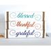 Grateful, Thankful, Blessed, Coastal Autumn Signs with twine

These three classic beachy fall signs make the perfect addition to your coastal autumn or traditional decor! Beautiful fall colors with twine accents, these 3 can stand alone on a shelf, window sill or mantel, and they fit perfectly on an autumn or coastal themed tiered tray display! They measure 12x2.5x.75 and are the perfect size for any space. Keep them together or have one in every room! These are sold separately or as a trio. These signs are stained and hand painted using chalk paint on solid wood. Every sign is custom made to order.
