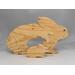 Wooden toy rabbit puzzle featuring a mama and baby bunny. The puzzle is handmade and has a clear shellac finish.