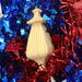 Handmade Wood Miniature Birdhouse Ornament crafted using only the finest select hardwoods and traditional woodworking tools. Each ornament is individually finished with a blend of mineral oil and beeswax to bring out the natural beauty of the wood.