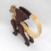 Handmade wood dragon figurine made from select grade contrasting hardwoods and hand-finished with a custom mixture of mineral oil and waxes.