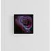 Example of Black Rose fine art print on blank wall with black frame.