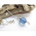 Light blue glass wire wrapped bead pendant on your choice of 20 or 22 inch sterling silver chain necklace.