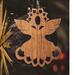Handmade Victorian Style Fretwork Angel Christmas tree ornament. Made from upcycled hardwood and hand finished with a custom blend of oil and waxes applied hot for deep penetration and durability.