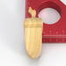 Handmade Wood Birdhouse Ornament Collectable Christmas Tree Ornament shapeed like a Christmas tree. Made from select-grade hardwoods, hand-sanded, and finished with a custom blend of oils and waxes using traditional woodworking tools.