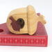 Handmade Wood Birdhouse Ornament Collectable Christmas Tree Ornament shapeed like a Christmas tree. Made from select-grade hardwoods, hand-sanded, and finished with a custom blend of oils and waxes using traditional woodworking tools.