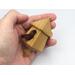 Handmade miniature birdhouse ornament crafted from select hardwoods, featuring a meticulous finish with a beeswax and oil blend—a collectible and charming decorative piece.