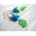 starfish dangle earrings are a fashionable choice. Using genuine sea glass in bright green and colorful glass starfish beads.