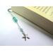 Set of two mini ocean beaded bookmarks, one with a sparkling seahorse and the other with a silver starfish charm.