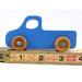 unHandmade wooden toy pickup truck painted in baby blue with metallic sapphire blue trim. The truck features non-marring amber shellac wheels and is part of my Play Pal Collection. A close-up shot of the toy truck on a white background. Made to Order.defined
