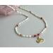 Rice pearl and fuchsia necklace with gold lotus flower pendant