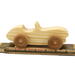 A handcrafted wooden toy convertible sports car, finished with a custom blend of oils and waxes, is the perfect gift for young children.