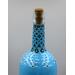 Close up of top design on bottle