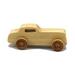 Handmade wooden toy car finished with mineral oil and beeswax, for kids aged three and up.