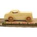 Handmade wooden toy car finished with mineral oil and beeswax, for kids aged three and up.