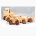 Handmade wooden toy truck play set includes three cars and a tractor-trailer finished with clear and amber shellac with metallic sapphire blue trim.