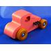 Handmade wooden toy car '27 T-Coupe Hot Rod painted pink with metallic sapphire blue, black trim, and nonmarring amber shellac wheels.