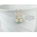 Peach pearl and aqua apatite wire wrapped earrings with 14K gold filled ear wires.