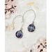 2 inch long earrings are comprised of rainbow flourite beads wrapped using Argentium silver on handmade earring wires.