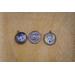 Cat and dog round silver photo charms next to a dime to show size comparison.