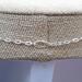 Vintage stainless steel cable chain close-up showing lobster clasp detail.