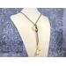 Peridot jasper donut pendant and teardrop tassels with bronze SilverSilk knitted wire chain.