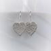 Small hammered sterling silver heart earrings by MariesGems.