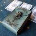 This Premium Handmade Leather Tarot Card Case features a luna moth, crescent moon, antlers and flowers.