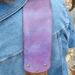 The unique hand dyed finish and adjustable sizing are the standout features of this strap. The center section of the strap is hand dyed in Violet Cosmos. Our dying process creates many shades of purple, violet and blue tones. The dyes interact with the natural characteristics of the full grain leather, creating a unique effect. The Violet center is accented with Antique Dark Brown adjustment slots that allow for a completely custom fit & feel. This strap has a great deal of depth in the dye color that is hard for the camera to capture, but there is a lot of wow factor here. Because of our hand dying process and the unique characteristics of each hide, your strap will be as special and unique as you.