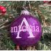 Purple Christmas Round 3" Ornament with a single white initial in the center with a name decal layered on top in lilac.  