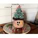 This is a handmade Christmas elf made with a real dried gourd. Including his Christmas tree hat, he is 12 inches tall and 4.5 inches wide. 