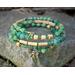 Shades of green, tan and gold memory wire bracelet with 4 strands. Casual and rustic.