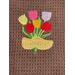 Wooden Shoes and Tulips on Brown Towel