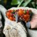 Glass and ceramic beads with two different leaf charms on a memory wire. Just beautiful!