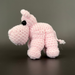 light pink crochet mini stuffed hippo with black eyes