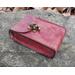 This is a Premium Handmade Leather Tarot Card Case. The star of this tarot deck box is the uniquely hand dyed leather with luscious swirling shades of berry. front view with antique  brass clasp.