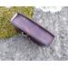 This Premium Handmade Leather Tarot Card Case features familiar felines silhouetted against a deep violet. Side view of case. Plain violet.This Premium Handmade Leather Tarot Card Case features familiar felines silhouetted against a deep violet.
