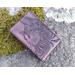This Premium Handmade Leather Tarot Card Case features familiar felines silhouetted against a deep violet. Back of case with portrait of cat in swirling spiral