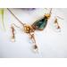 Handmade Copper and brass necklace set featuring a natural emerald stone and matching crystal earrings.