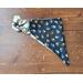 Scrunchie Reversible Dog Bandana - Baseballs and Paw Prints - folded on paw print side