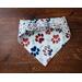 Scrunchie Reversible Dog Bandana - Patriotic Paw Prints and Small Bone and Paw Prints back showing scrunchie band
