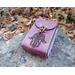 This Premium Handmade Leather Tarot Card Case features a a Hamsa Hand symbol. The Tarot Card Box has been hand crafted, hand dyed and hand sewn in our shop. The leather Tarot Deck Holder is dyed in a color called Violet Cosmos which includes many purple and violet tones