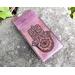 This Premium Handmade Leather Tarot Card Case features a a Hamsa Hand symbol. The Tarot Card Box has been hand crafted, hand dyed and hand sewn in our shop. The leather Tarot Deck Holder is dyed in a color called Violet Cosmos which includes many purple and violet tones.