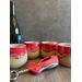 Four red hand-thrown ceramic wine tumblers, each tumbler holds 12 ounces.